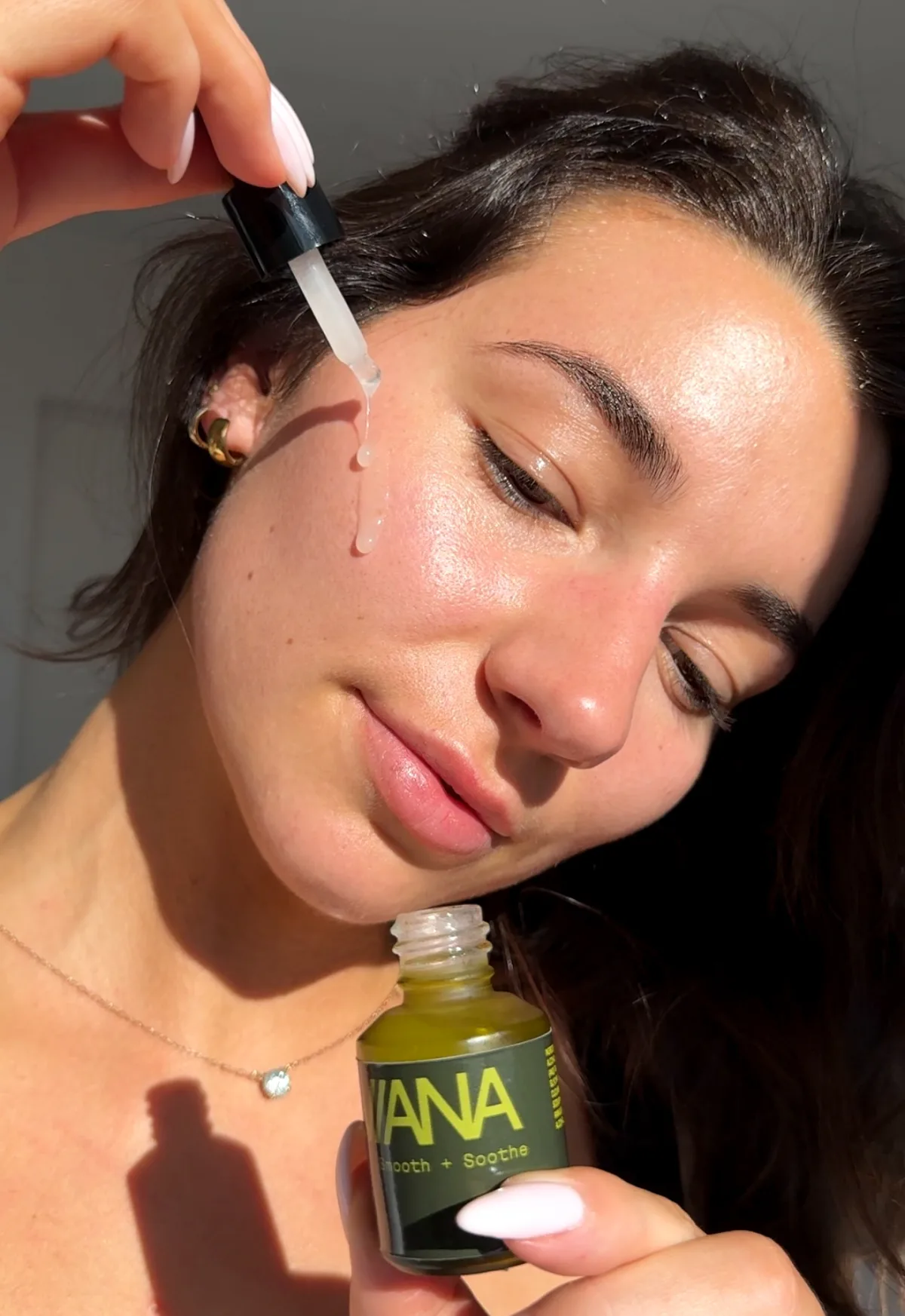 Tallow Hydration Serum applied with the dropper